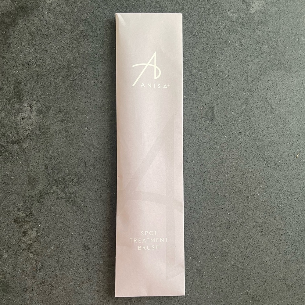 New and Sealed Anisa Spot Treatment Brush